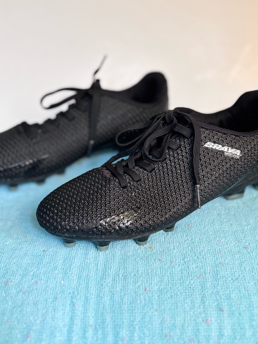 Black Brava Soccer cleats with textured knit pattern youth 4. #soccer #football